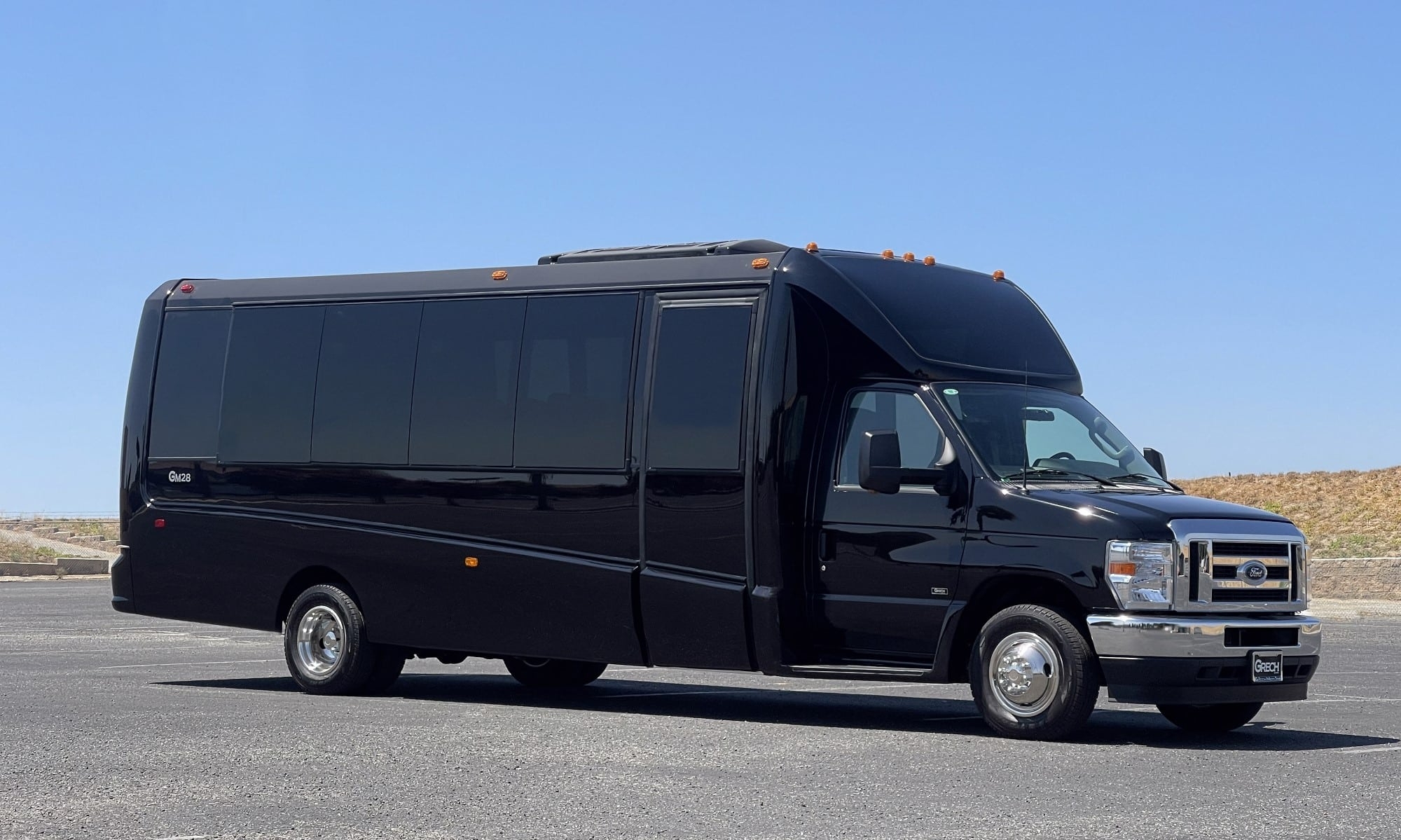 22 Passenger GM28 Ford E450 Black Grech Motors
